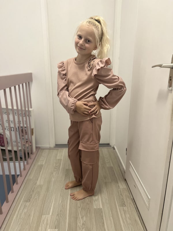 Fashion by Livana | Blouse lichtroze lange mouw met glitterstenen